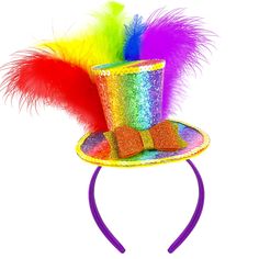 PRICES MAY VARY. 🌈【HIGH-QUALITY MATERIAL】: Mardi Gras rainbow feather hat headband is made of high-quality Glitter leather material. It is a new type of leather material with fine flash particles on the surface, which is very dazzling. The overall workmanship of the headband is fine, it is not easy to fade and deform, has no special smell, and is durable. 🌈【UNIQUE SHAPE】: Mardi Gras feather headband adopts classic colorful feathers and top hat as styling elements, plus rainbow color matching, Top Hat Headband, Tiny Hat, Top Hats For Women, Rainbow Feather, Gay Pride Month, Hat Headband, Hat Fascinator, Mini Top Hat, Tea Party Hats