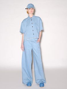 We’ve long considered a denim shirt the backbone of a casual wardrobe, and are excited to introduce Pre Fall 23’s iteration in a soft garment-washed mid-weight denim. Tailored to a wide, cropped fit, this easy style features a frayed hem for additional appeal. Rosetta Getty's 10oz denim is mid-weight with a vintage feel. Offering season-spanning wear, the fabric features in styles that have been garment-washed for an inherent sense of ease. Spread collar Drop short sleeves Button front Chest pat Cropped Denim Shirt, Valentino Red, Fall 23, Rosetta Getty, Easy Style, Red Valentino, Cropped Denim, Pre Fall, Casual Wardrobe