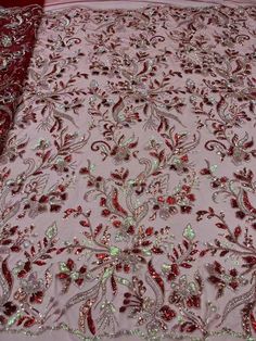 We offer a variety of fashion handmade fabric，those are widely use for wedding dress，garment and fashion cloth. we sell it by yard，our minimum order is 1 yards，and we always package it 15 yards for one roll，the width is 130cm Material ： sequins , beads ,mesh ，Rayon,polyester. Symmetrical embroidery floral pattern, with lovely flowers in the middle, scalloped border. You can also cut and use separately. Perfect for dress, tops, wedding veil.  You can split the piece up and have one scalloped edge Glamorous Lace Fabric With Intricate Embroidery, Elegant Red Embroidered Fabric With Sequins, Figure Embroidery Design, Figure Embroidery, Fabric Wedding Dress, Strawberry Dress, Scalloped Border, Beaded Lace Fabric, Wedding Dress Lace