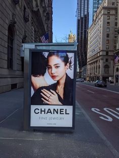 there is a billboard on the side of the street that says chanel fine jewelry