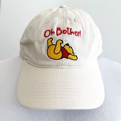 Disney Winnie The Pooh Dad Hat Cap Brand New With Tags One Size Fits Most (Adjustable) Beige/Khaki Large Embroidered Winnie The Pooh Graphics On Front “Oh Bother!” Catch Phrase Winnie The Pooh Gifts, Disney Hats, Catch Phrase, Disney Accessories, Disney Winnie The Pooh, Dad Hat, Hat Cap, Dad Hats, Winnie The Pooh