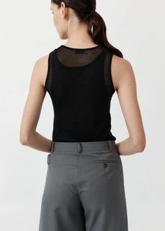 Playing with the versatility of creative layering, the Semi Sheer Double Layer Tank boasts a 100% TENCEL™ Lyocell construction for a semi-sheer, diaphanous look. Boasting a layered neckline, sleeveless tank silhouette and layered feature, The Semi Sheer Double Layer Tank is a playful reimagining of St Agni's signature, minimalist style. Details: Semi sheer Layered neckline Sleeveless 100% Tencel Wash and dry garment turned inside out Cold hand wash separately in mild detergent Double Layer Tank Top, Layered Tank Top, Garment Details, St Agni, Layering Tanks, Mother Denim, Jumper Shirt, Minimalist Style, Sleeveless Tank