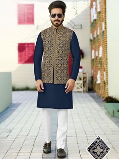 Up your style game with this jacket, uniquely designed and embroidered all over by hand and machine. Comes with a white trouser style pyjama to give a more refined and sophisticated look by adding a blue colour kurta. The Nehru jacket and kurta pyjama set are crafted from excellent art silk fabric. Please be aware: some colour differences may occur due to photographic factors. There may be a measuring discrepancy of up to 1 inch. NOTE:Cost Includes Stitched Kurta, Nehru Jacket & Matching Pyjama mens kurta pyjama with Nehru jacket,wedding kurta pyjama with nehru jacket,kurta pajama with nehru jacket for wedding,latest kurta pajama with nehru jacket Winter Nehru Jacket With Zari Work, Luxury Blue Nehru Jacket For Formal Occasions, Eid Nehru Jacket With Zari Work And Stand Collar, Winter Nehru Jacket With Resham Embroidery, Kurta Pajama Men Wedding Indian, Traditional Nehru Jacket With Stand Collar For Eid, Nehru Jacket With Zari Work For Puja, Navratri Nehru Jacket With Dabka Embroidery, Nehru Jacket For Puja And Eid