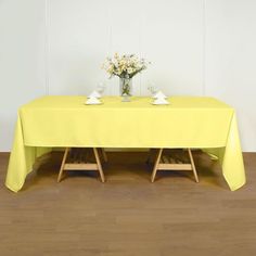 the table is covered with a yellow cloth