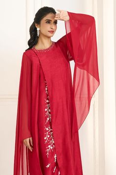 Red double folded, overlapped paneled layered tunic with contrasting floral embroidery and cascading draped long sleeves. - Aza Fashions Long Drapes, Layered Tunic, Tunic Pattern, Embroidered Tunic, Long Red, Draped Fabric, Womens Tunics, Asymmetric Hem, Aza Fashion