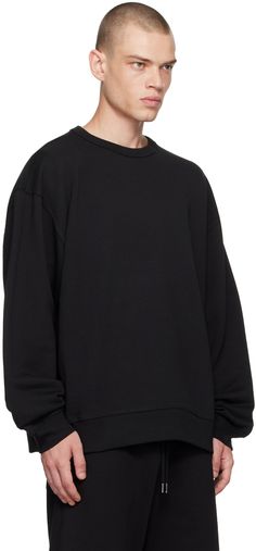 Heavyweight French terry sweatshirt. · Rib knit crewneck, hem, and cuffs · Dropped shoulders Supplier color: Black Oversized Black Sweatshirt With Ribbed Neckline, Black Sweater With Ribbed Cuffs And Drop Shoulder, Oversized Sweater With Ribbed Cuffs For Streetwear, Oversized Sweater With Ribbed Neckline For Streetwear, Streetwear Sweater With Ribbed Neckline And Drop Shoulder, Knit Crewneck, Dries Van Noten, Oversized Sweatshirt, French Terry