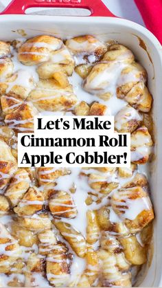 cinnamon rolls with icing in a white casserole dish on a red cloth