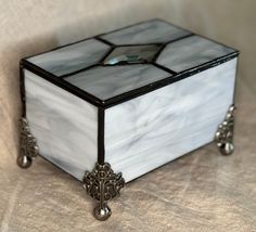 a white and black box sitting on top of a table