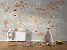 a child's room with a map wallpaper and toy animals on the floor