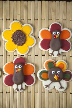 decorated cookies with turkeys and sunflowers on a bamboo mat