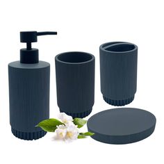 three pieces of bathroom accessories including soap dispenser, soap dish and toothbrush holder