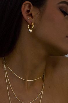 The classic gold hoop reinvented. Crafted in high polish 18K Gold vermeil with sterling silver accent, the Greyson hoops are a staple in the Hydez Essential Collection. These sophisticated head-turners will luxe up any look. Our two tone design means you’ll never have to choose between gold and silver.Materials: 18K Gold Vermeil and Sterling SilverDimensions: 20mm hoop, 3mm width What is 18K Gold Vermeil?: 3 microns of 18K Gold over Sterling Silver. Vermeil is far more durable to wear than tradi Gold-plated Sterling Silver Hoop Earrings, Gold Plated Sterling Silver Hoop Earrings, Timeless Gold Huggie Earrings With Diamond Cut, Gold Tarnish-resistant Huggie Earrings For Anniversary, Timeless Gold Diamond Cut Huggie Earrings, Yellow Gold Plated Sterling Silver Hoop Earrings, Everyday Luxury Gold Hoop Huggie Earrings, Gold Plated Huggie Earrings With Spring Ring Clasp, Gold Huggie Earrings For Anniversary