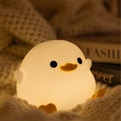 Illuminate your surroundings with adorable charm using our Rechargeable Duck Night Light. This delightful chibi duck light brings a touch of whimsy to any space, featuring a squishy and soft silicone construction. With a convenient 20-minute timer and two light modes, you can create the perfect ambiance for relaxation or play. ◆ Playful Design: Embrace the cuteness of a chibi duck with this charming night light that adds a joyful touch to your room decor. ◆ Customizable Lightin Choose between two light modes to suit your mood or setting, creating a cozy and inviting atmosphere. ◆ Timer Function: Set the night light to turn off automatically after 20 minutes, making it a perfect companion for bedtime routines. ◆ Soft and Squeezable: Crafted from soft and squishy silicone, this duck night li Squishy Lamp, Chibi Duck, Duck Light, Silicone Duck Lamp, Duck Lamps, Led Lights Bedroom, Duck Lamp, Duck Night Light, Kawaii Items Night Lights