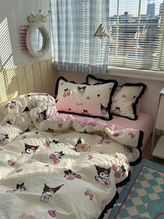 a bed room with a neatly made bed next to a window