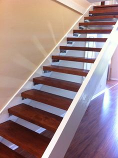 there is a wooden stair case in the house