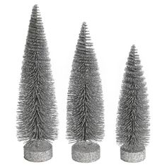 three tinsel christmas trees are shown in silver