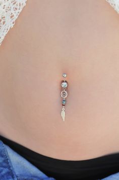 "A one of a kind belly button ring full of boho-chic style! Handmade of a Silver barbell, dreamcatcher and feather pendants, and Swarovski crystal beads. Quality meets style for the hottest look out there! Do not hesitate to contact me for special requests and customization! ♥♥ ▶ Sterling Silver curved barbell, 11 mm long (not including the barbells) a universal fit. ▶ Swarovski faceted crystal beads- Blue, green and red color ▶Silver dreamcatcher and feather pendants, 4 cm (1.57 inches) long (m Bohemian Belly Rings As A Gift, Bohemian Internally Threaded Body Jewelry As Gift, Bohemian Handmade Belly Rings For Gifts, Bohemian Handmade Belly Rings As Gifts, Handmade Dream Catcher, Silver Pearl Ring, Handmade Dreamcatcher, Navel Ring, Swarovski Beads