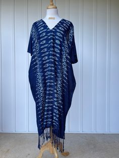 You will look fabulous in this truly unique hand made kaftan from hand woven (with hand woven pattern!) and hand dyed thread. The kaftan feels as good as it looks with soft and graceful drape. Pefect for evening wear, events and out and about it is made with care and long lasting quality. Bohemian Handloom Tunic Kurta, Bohemian Handloom Kaftan For Summer, Long Ikat Print Kaftan For Summer, Bohemian Ikat Print V-neck Kaftan, Long Ikat Print Kaftan For The Beach, Summer Long Ikat Print Kaftan, Bohemian Blue Kimono With Natural Dye, Blue Bohemian Kimono With Natural Dye, Blue Bohemian Poncho For Beach