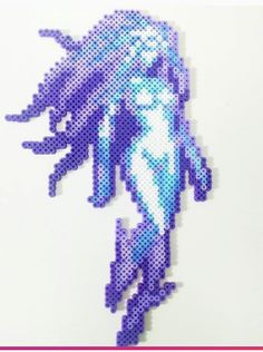 an image of a woman with long hair in blue and white pixellated art style