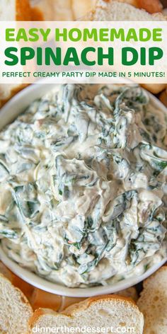 homemade spinach dip in a bowl surrounded by toasted bread