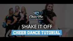 cheerleaders in black and blue outfits with text that reads shake it off, cheer dance