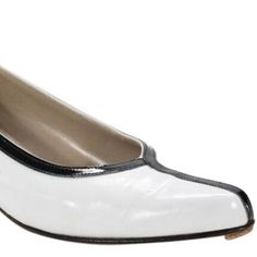 For Sale Is A Pair Of Salvatore Ferragamo, Size 9n, White Leather And Black Patent Leather, 1" Kitten Heels With A Unique, Color Block Design And Almond Shaped Toes! These Are Perfect Shoes For You When You Want A Pair Of White Low Heels With An Edgy Modern Style! The Shoes Are The Perfect Pair Of When You Want A Pair Of White Heels That Are A Little Different! The Low Heels Are Made Of A White Leather And Black Patent Leather In A Size 9n And Have A Great Color Block Look. N10901 Classic Silver Low Heel Shoes, Classic Silver Low Heel Heels, Silver Patent Leather Heels For Formal Occasions, Formal Silver Patent Leather Heels, Classic Silver Low Heels, Elegant Silver Patent Leather Heels, Classic Silver Fitted Heels, Classic Fitted Silver Heels, Classic Silver Heels For Formal Occasions