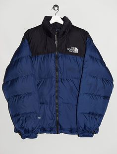 "The North Face 700 puffer jacket in navy blue and black, insulated with goose down. - Size tag: Please always check measurements before buying. Men's L - Measurements (laying flat): Pit to Pit: 25\" Length: 29.5\" Sleeve: 24.5\" Pit to Cuff: 23.5\" Across the shoulders: 22\" -Wear: /Please see images for details/ Overall in good used condition. Stains on the blue part (front, back and sleeves) as visible on the pictures. - Fabric: Nylon Polyester Goose Down *All of our items are preloved pieces so some signs of natural wear and age are to be expected. Please look through the photos carefully to check if the condition is to your satisfaction. *All efforts are made to show any defects however small imperfections may be missed. *We try to describe the sizes as accurately as possible, but ple Blue Duck Down Puffer Jacket For Fall, Outdoor Blue Down Puffer Jacket, Blue Duck Down Long Sleeve Puffer Jacket, Blue Insulated Puffer Jacket For Outdoor, Insulated Blue Puffer Jacket For Outdoor, Blue Puffer Outerwear For Hiking, Navy Puffer Jacket For Winter Outdoor Activities, Navy Puffer Jacket For Winter Outdoors, Blue Down Puffer Jacket For Streetwear