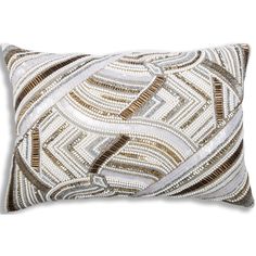 a white and gold decorative pillow on a white background with an abstract design in the middle