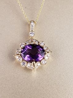 "Amethyst and Diamond Halo Pendant. This vintage look pendant showcases a vivid, deep purple, Oval cut Genuine Amethyst gemstone, suspended in place by (4) substantial gold prongs and surrounded in a halo of genuine bright white Diamonds. All 14k Yellow Gold. **Amethyst is a February Birthstone, and the Pantone color of the year for 2018. **This listing is for the pendant only. Chain not included, for display purposes only. 14kt Yellow Gold chains available for purchase upon request. **Please fe Elegant Oval Purple Gemstones, Elegant Purple Oval Gemstones, Elegant Purple Gemstones With Accents, Elegant Amethyst Gemstones With Accent Stones, Luxury Purple Diamond-cut Jewelry, Heirloom 14k Stamped Amethyst Jewelry, Exquisite Amethyst Jewelry With Center Stone, Elegant Purple Necklace With Prong Setting, Elegant Purple Gemstones With Halo Setting