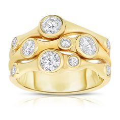 a yellow gold ring with diamonds on it