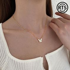 ✨ Attention: Elevate your style with our Delicate Butterfly Necklace! 🦋 Crafted with precision and designed for elegance, this necklace is the perfect accessory to add a touch of charm to any outfit. 🔥 Interest: Made with a beautiful butterfly pendant, this necklace symbolizes transformation and grace. Its minimalistic design makes it versatile for both casual and formal wear. Whether you're dressing up for a special occasion or adding a little sparkle to your everyday look, this necklace is your go-to choice. 💎 Desire: Imagine the compliments you'll receive and the confidence you'll feel wearing this stunning piece. Its high-quality craftsmanship ensures durability and lasting shine, making it a perfect gift for yourself or a loved one. Each necklace comes beautifully packaged, ready t Trendy Butterfly Jewelry For Gift, Trendy Butterfly-shaped Jewelry With Adjustable Chain, Trendy Butterfly Shaped Jewelry With Adjustable Chain, Trendy Butterfly Necklace For Gifts, Elegant Butterfly Necklace With Adjustable Chain, Elegant Butterfly Necklace With Clavicle Chain, White Butterfly Necklace With Delicate Chain, Trendy Butterfly Pendant Necklace For Gift, Elegant White Butterfly Charm Necklace