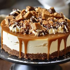 a cake covered in chocolate and marshmallows on top of a metal platter