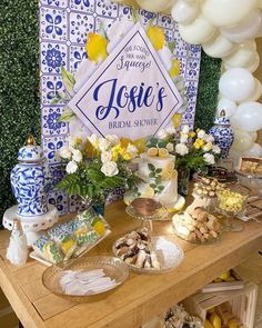 a table topped with lots of desserts next to a sign that says jose's bridal show