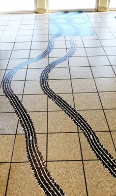 there is a train track on the floor