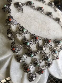 Circa 1800s Beautiful Art Nouveau Austro Hungarian Sterling Silver Coral Persian Turquoise Mother of Pearl Antique Festoon Bib Necklace See matching earrings in link below https://www.etsy.com/listing/693901515/circa-1800s-beautiful-art-nouveau-austro?ref=shop_home_active_1&frs=1 Anniversary Art Nouveau Filigree Necklace, Luxury Art Nouveau Formal Necklace, Silver Necklace With Intricate Art Nouveau Design, Silver Filigree Art Nouveau Necklace, Luxury Art Nouveau Pearl Pendant Necklace, Austro Hungarian, Persian Turquoise, Usa Jewelry, Bib Necklaces