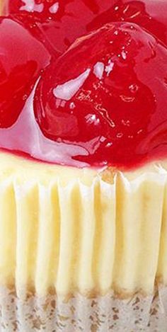 a close up of a cake with jelly on top