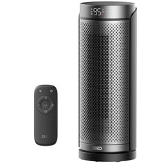 a black and silver speaker next to a remote control