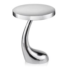 a chrome table with a white top