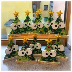 christmas trees with eyes and stars on them