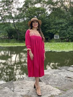 This is a gorgeous traditional Mexican dress perfect for any special event or even as Bridesmaid Dresses! The beautiful embroidered details around the collar are hand embroidered on a Loom. This dress is handmade with love for you by Mexican Artisans in Oaxaca, Mexico. Please note: This dress comes in one size which fits sizes Small, Medium and Large. You have the option to purchase the dress with the belt for a special price or buy the dress on its own. More colors available here: https://www.e Festive Wedding Dress With Embroidered Hem, Festive Pink Dress With Embroidered Neckline, Summer Wedding Dress With Embroidered Sleeves, Festive Embroidered Dress For Garden Party, Pink Long Sleeve Folk Dress, Bohemian Wedding Dress With Embroidered Sleeves, Pink Long-sleeved Folk Dress, Festive Embroidered Garden Party Dress, Traditional Fitted Bridesmaid Dress