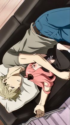 two anime characters laying on top of each other