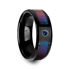 a black ring with blue and purple inlays