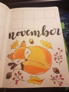 an open notebook with a drawing of a sleeping fox and the words november on it