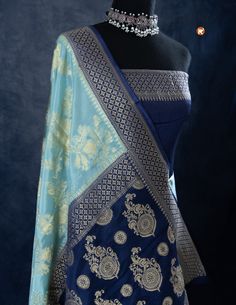 Indulge in luxury with our Sky Blue Khaddi Silk saree, adorned with delicate Golden Jaal work. Featuring a lightweight and airy fabric, this saree offers both comfort and elegance. Elevate your style with this beautiful saree and leave a lasting impression on any occasion! Luxury Blue Katan Silk Dupatta, Luxury Royal Blue Banarasi Silk Dupatta, Traditional Blue Pre-draped Saree With Self Design, Elegant Blue Pre-draped Saree With Zari Weaving, Blue Bollywood Banarasi Silk Pre-draped Saree, Blue Dola Silk Pre-draped Saree For Eid, Festive Blue Art Silk Pre-draped Saree, Elegant Blue Pre-draped Saree For Navratri, Blue Katan Silk Pre-draped Saree With Zari Work