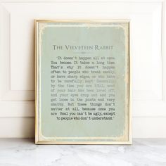 a framed poem on a marble counter top