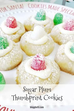 sugar plum thumbprint cookies on a white plate