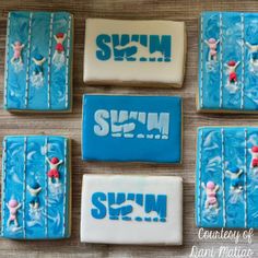 six decorated cookies with the words swim and swimmers in blue icing on top of each cookie