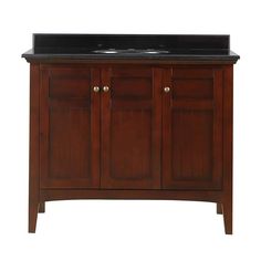 a bathroom vanity with black marble top and wooden cabinetry on the bottom, against a white background