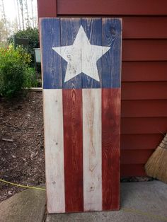 an american flag painted on wooden planks