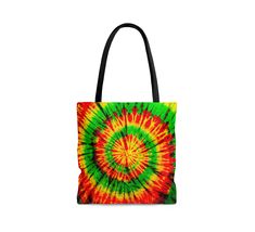 a multicolored tie - dyed tote bag on a white background